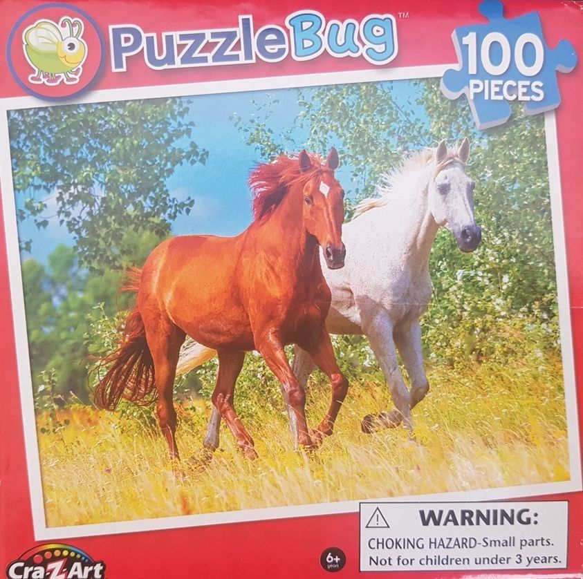 A chestnut horse and a white horse running side by side through a tall grassy field.