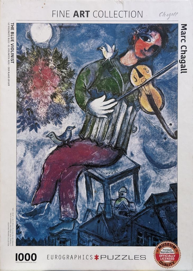 The Blue Violinist by Marc Chagall featuring a figure playing a violin above a small village scene.