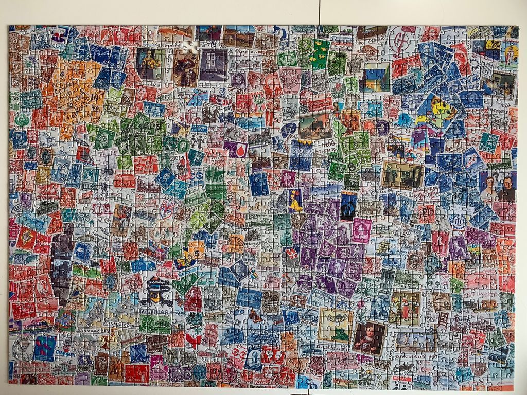 A collage of vintage Danish postage stamps arranged in a dense, rectangular pattern.