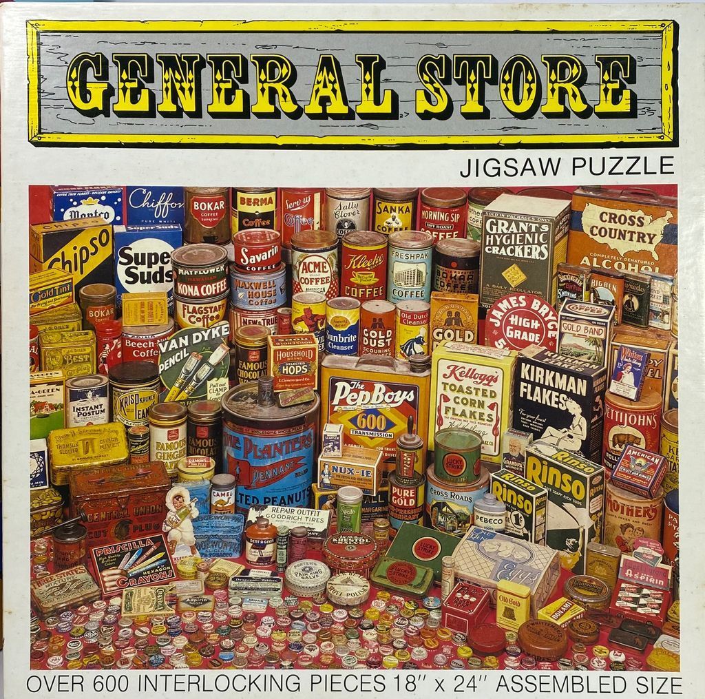 A nostalgic collection of vintage product tins, boxes, and bottle caps arranged in a general store display.