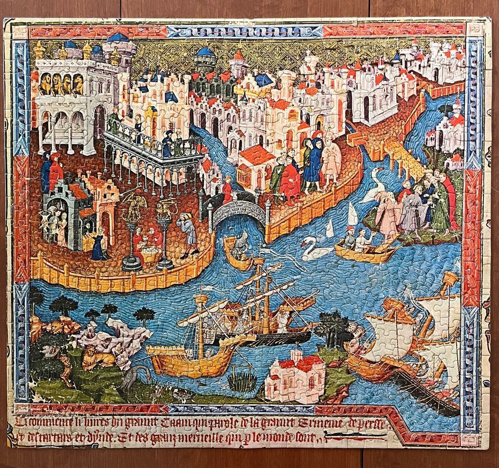 A medieval illuminated manuscript illustration showing a bustling city, a river with ships, and detailed figures.