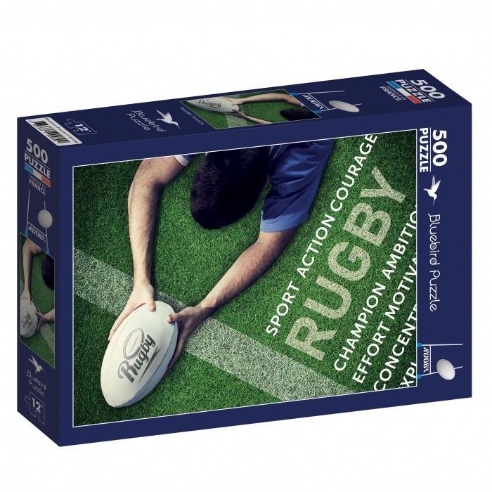 A rugby player scoring a try on a grassy field with superimposed motivational text.
