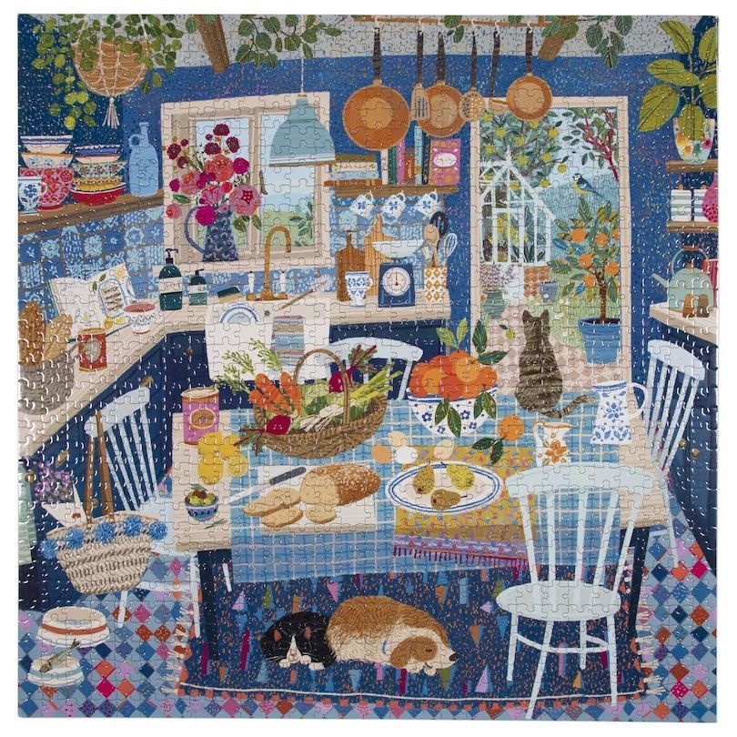 An illustration of a cozy, blue-themed country kitchen with fresh produce, a cat, a dog, and a garden view.