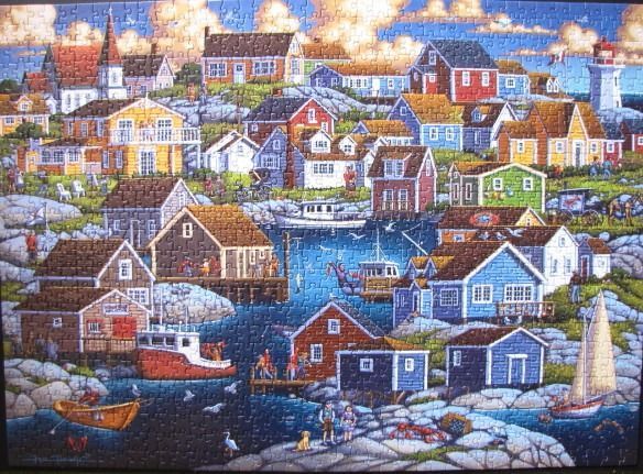 A coastal village illustration featuring colorful wooden houses, a small harbor with boats, and a lighthouse.