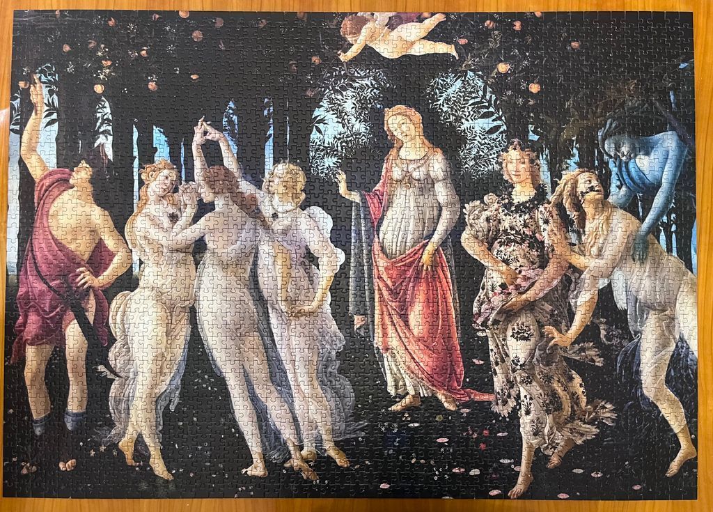 A reproduction of Botticelli's Primavera featuring mythological figures in a lush, dark garden setting.