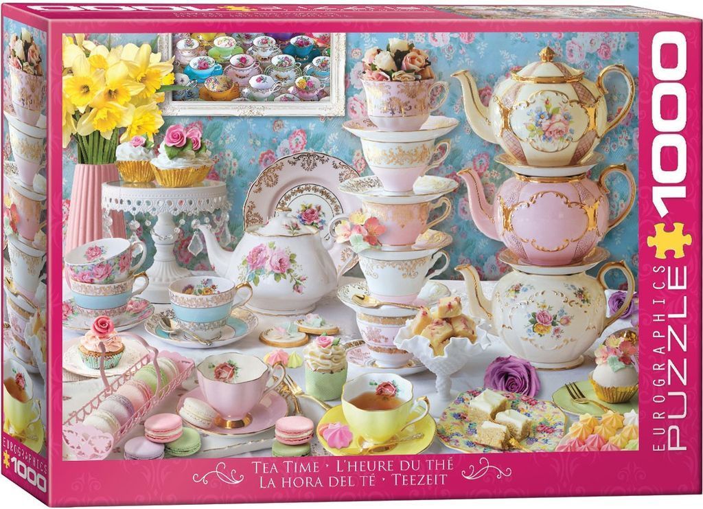 A still life scene of stacked teapots, fine china cups, and assorted pastries against a floral wallpaper background.