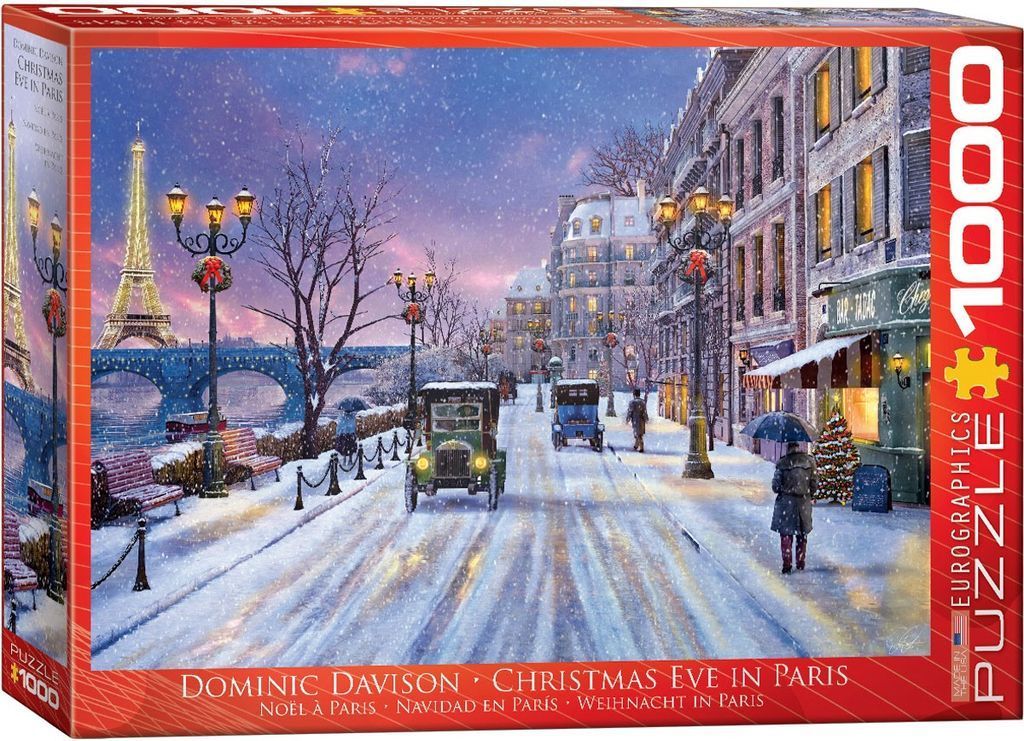 Snowy evening street scene in Paris with the Eiffel Tower in the distance at Christmas.