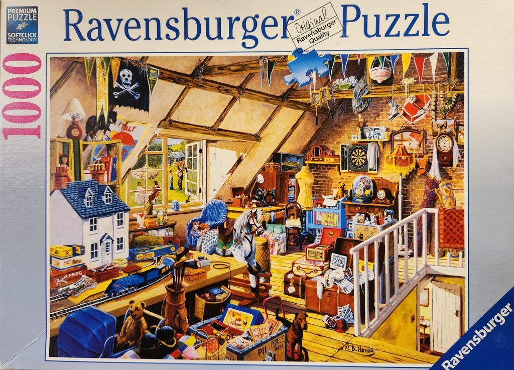 A cluttered attic room filled with toys, vintage items, and a window looking out to a sunny garden scene.