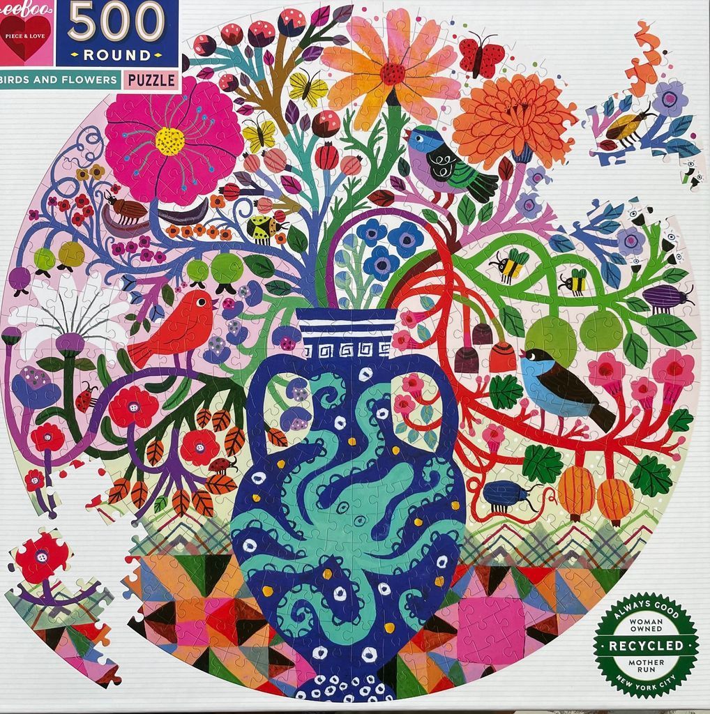 Whimsical folk-art style illustration of a blue vase overflowing with stylized flowers, birds, and insects.