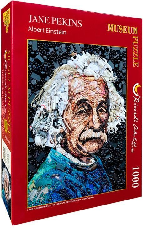 A mosaic portrait of Albert Einstein created from small toys, beads, and objects against a dark background.
