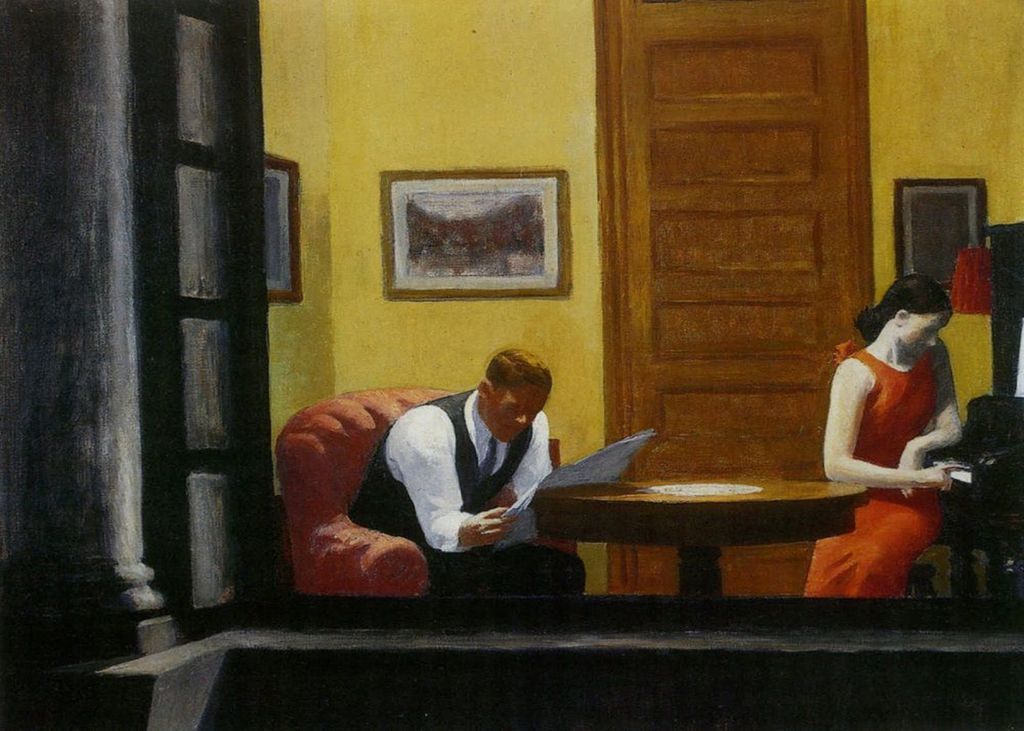 A man reading a newspaper in an armchair beside a woman playing a piano in a dimly lit, yellow-walled room.