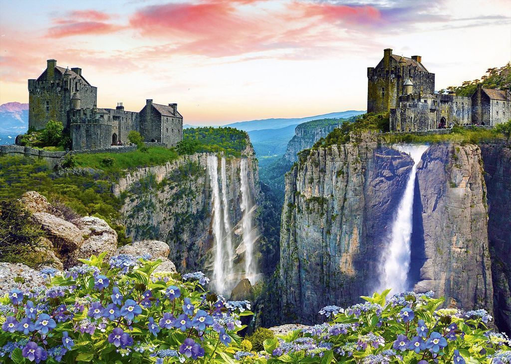 Two stone castles perched atop dramatic cliffs divided by a waterfall-filled canyon at sunset.