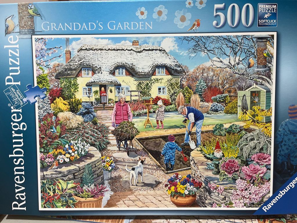 A nostalgic painting of a multi-generational family gardening in front of a thatched-roof cottage.