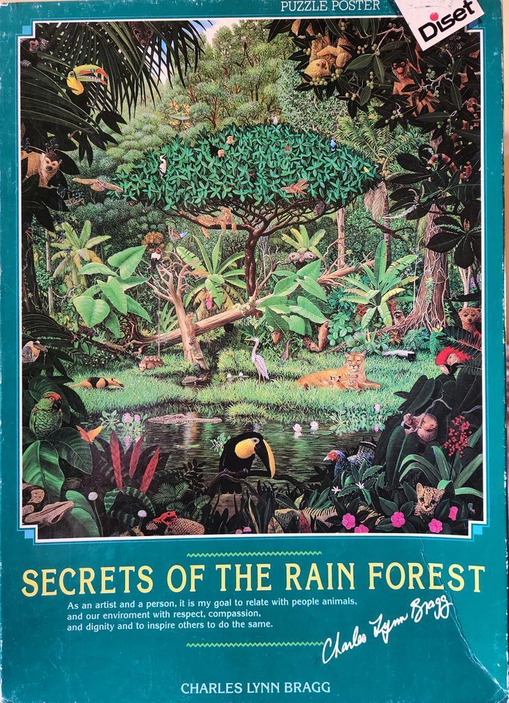 A lush rainforest scene dense with diverse animals and exotic plants by Charles Lynn Bragg.