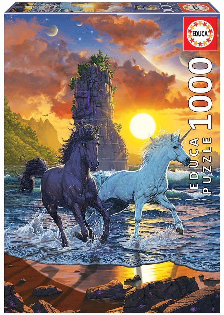 A black unicorn and a white unicorn running through surf on a beach at sunset with a rocky spire in the background.