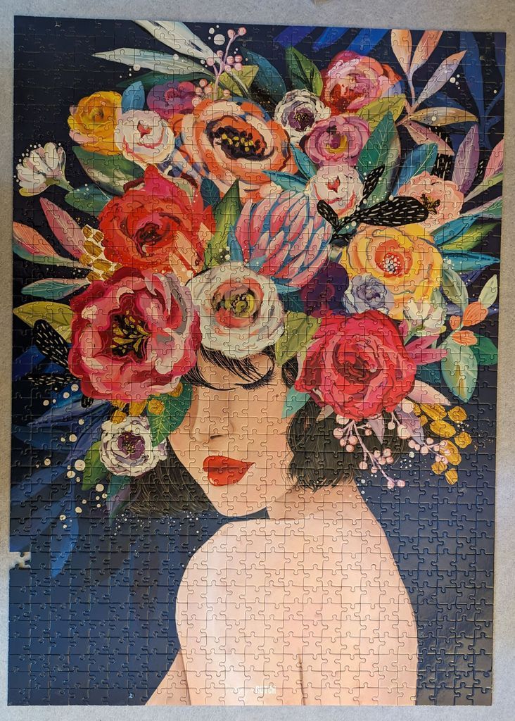 A digital illustration of a woman in profile with a large, vibrant bouquet of flowers instead of hair.