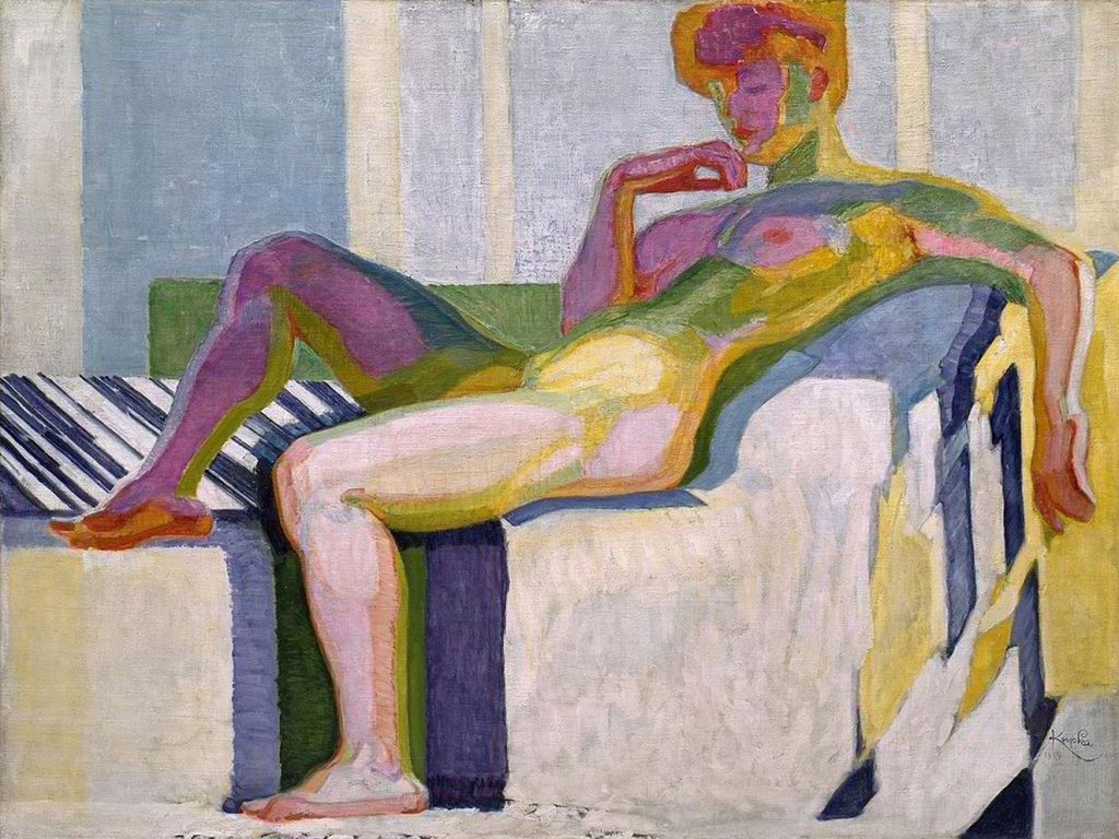 An expressionist painting of a nude figure reclining on a geometric divan in shades of yellow, purple, and green.