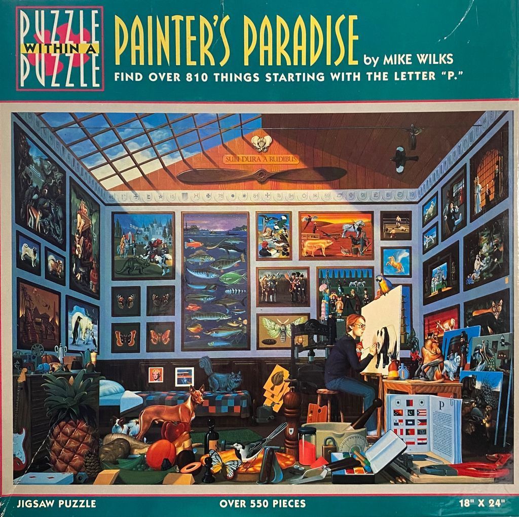 An artist in a studio filled with paintings and objects, all representing things starting with the letter P.