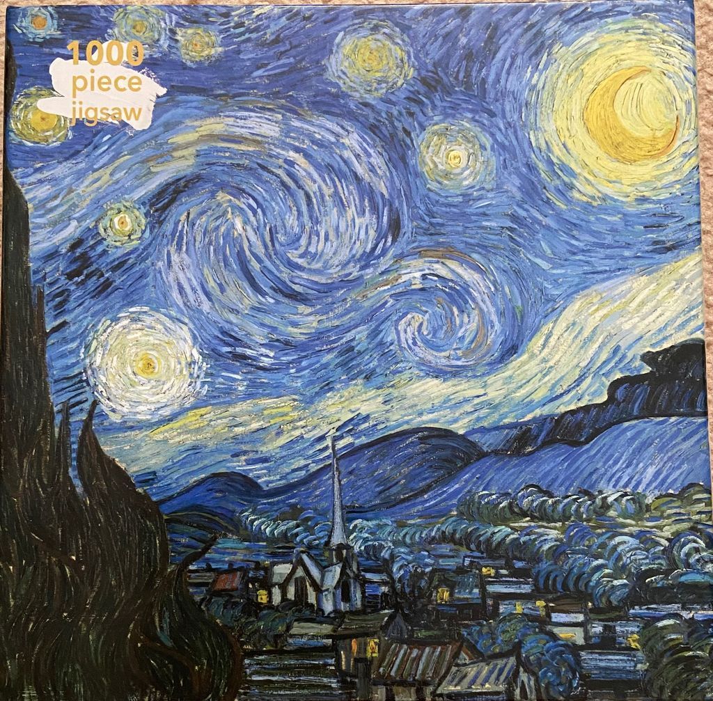 Van Gogh's The Starry Night painting showing a swirling night sky over a quiet village