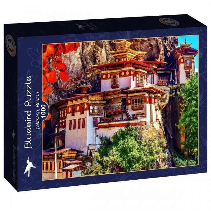 Photograph of the Paro Taktsang monastery clinging to a cliffside in Bhutan.