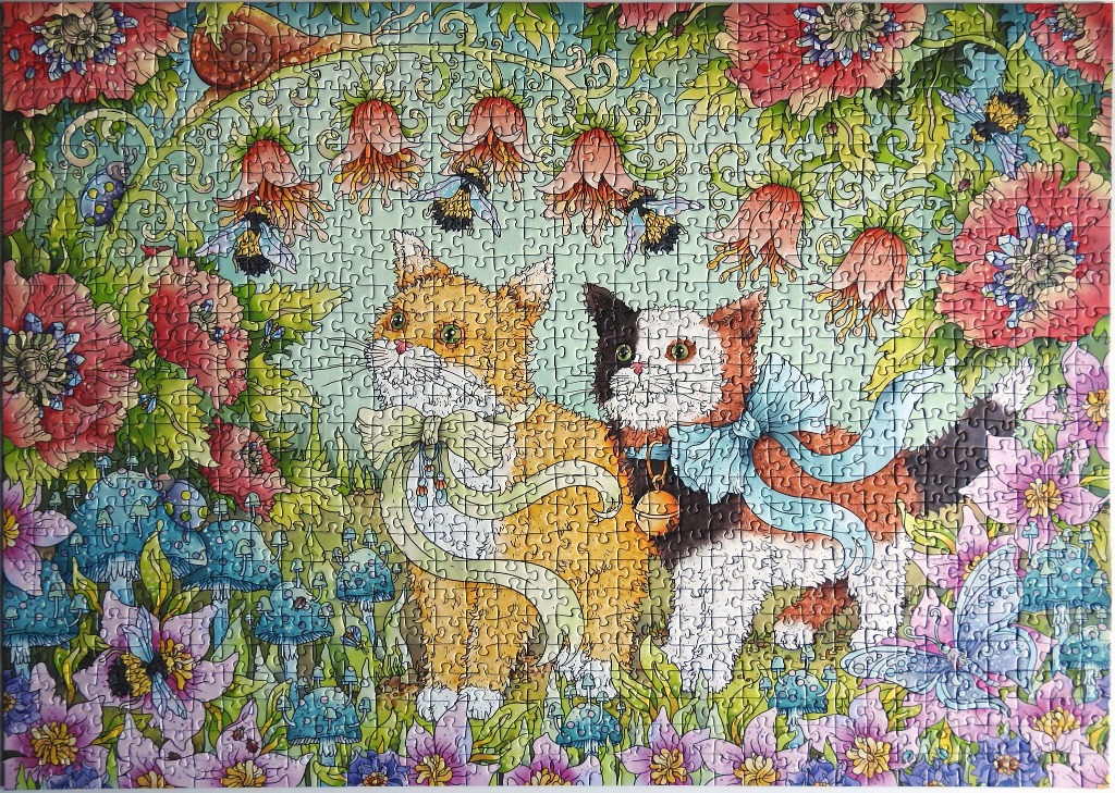 Whimsical illustration of two cats in a flower garden with bees and butterflies.