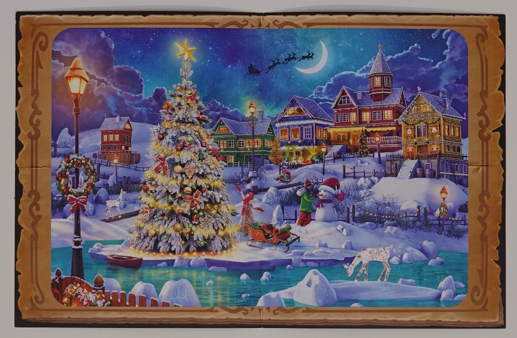 A snowy Christmas village scene with a large illuminated tree, children playing, and Santa’s sleigh flying in the sky.