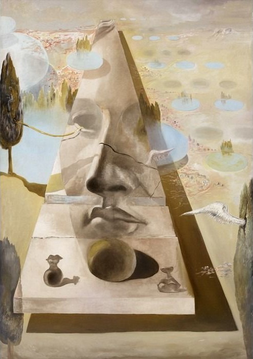 Surrealist painting featuring a giant stone face fragment in a vast, arid landscape with floating spheres.