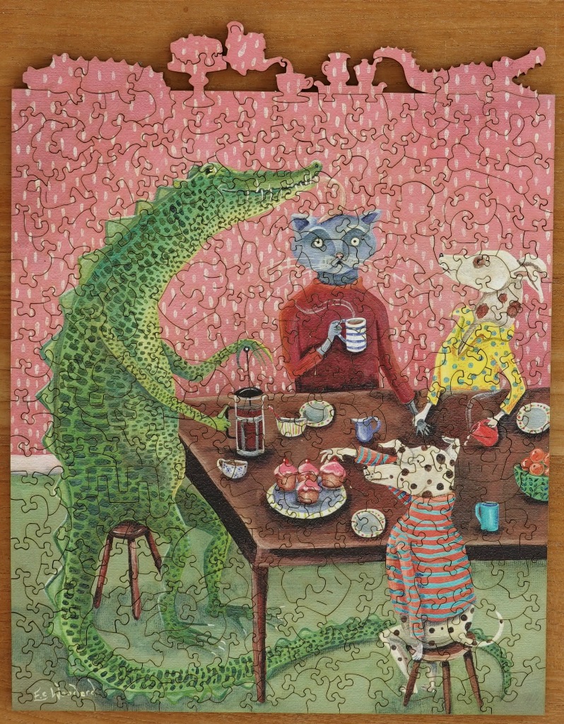 Whimsical illustration of an alligator, a cat, and two dogs sharing tea at a table in a pink room.