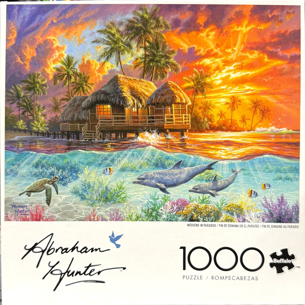 A tropical hut over water at sunset, with dolphins and a sea turtle visible beneath the waves.