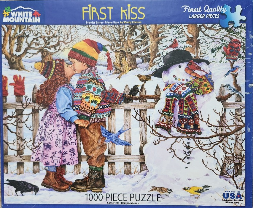 A young boy and girl sharing a first kiss beside a snowman in a snowy, bird-filled garden.