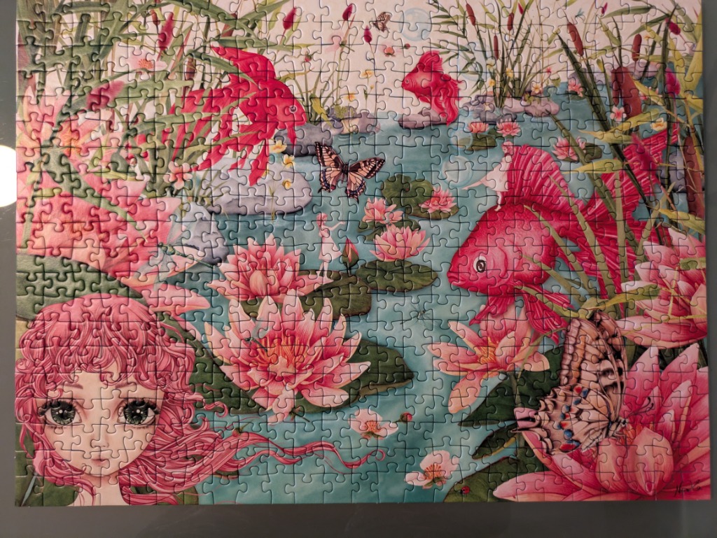 An illustration of a girl with pink hair looking into a pond filled with large pink water lilies and bright red goldfish.