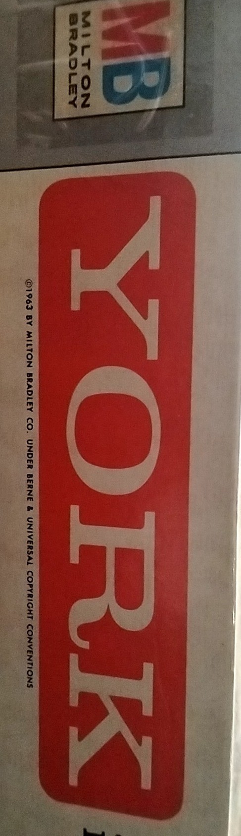 The word YORK written in large, white, serif capital letters against a solid red, rounded rectangular background.