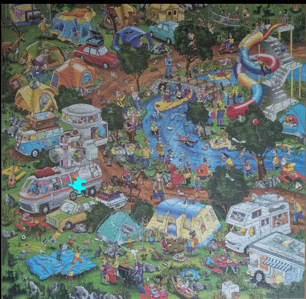 A busy cartoon illustration of a chaotic, crowded campground scene with campers, vehicles, and a river.