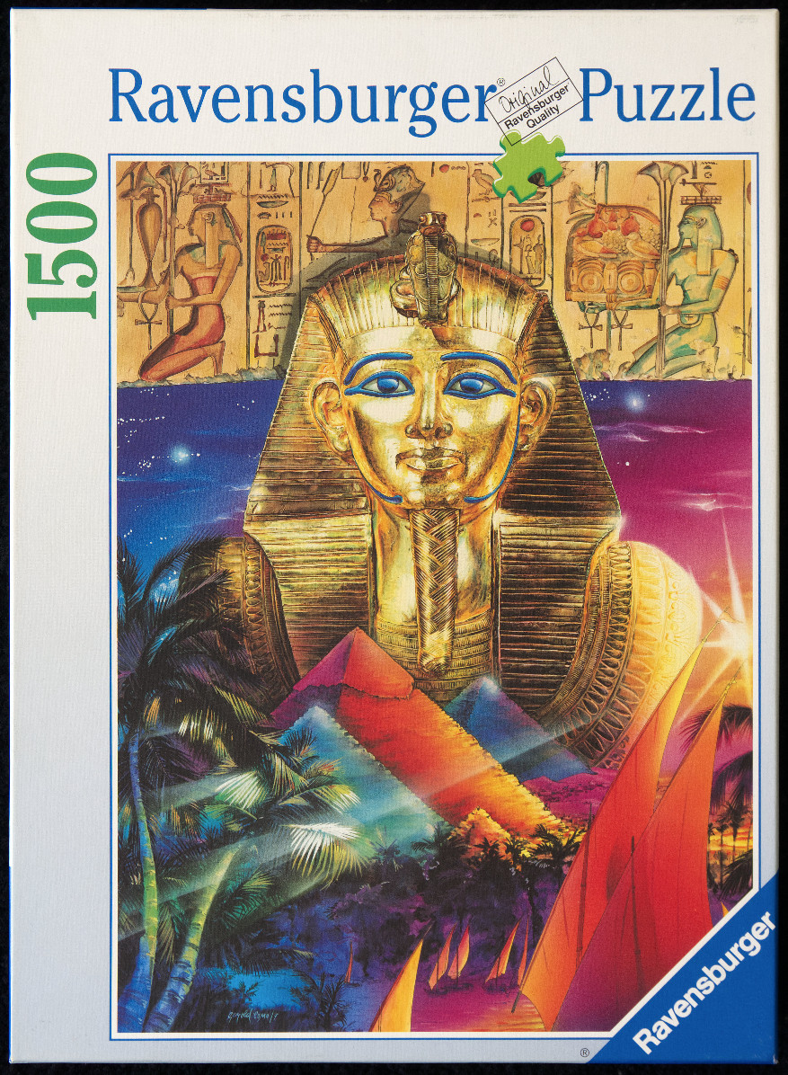 An illustration of the golden Tutankhamun mask over pyramids, palm trees, and a sunset Nile scene.