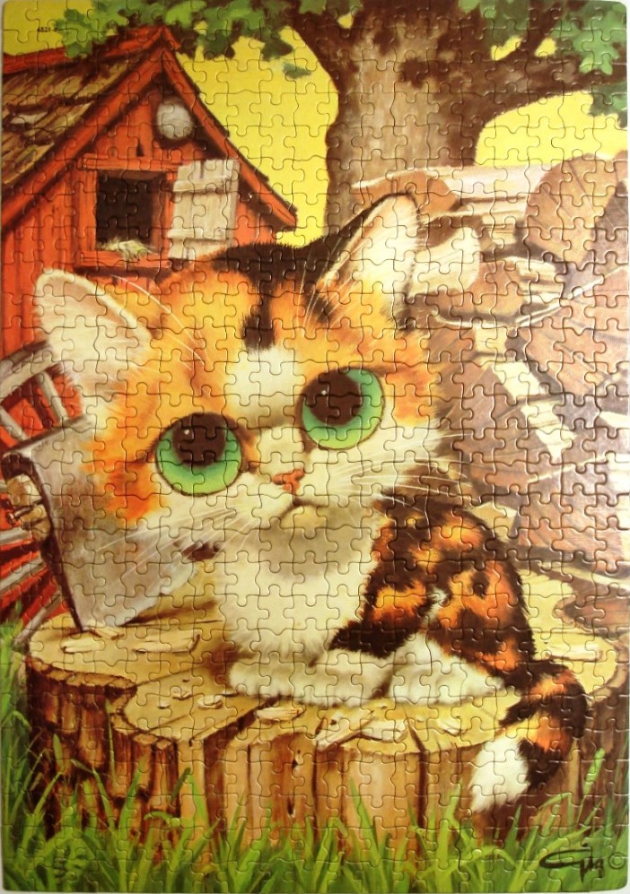 Illustration of a cute, wide-eyed calico kitten sitting on a tree stump in front of a rustic red barn.