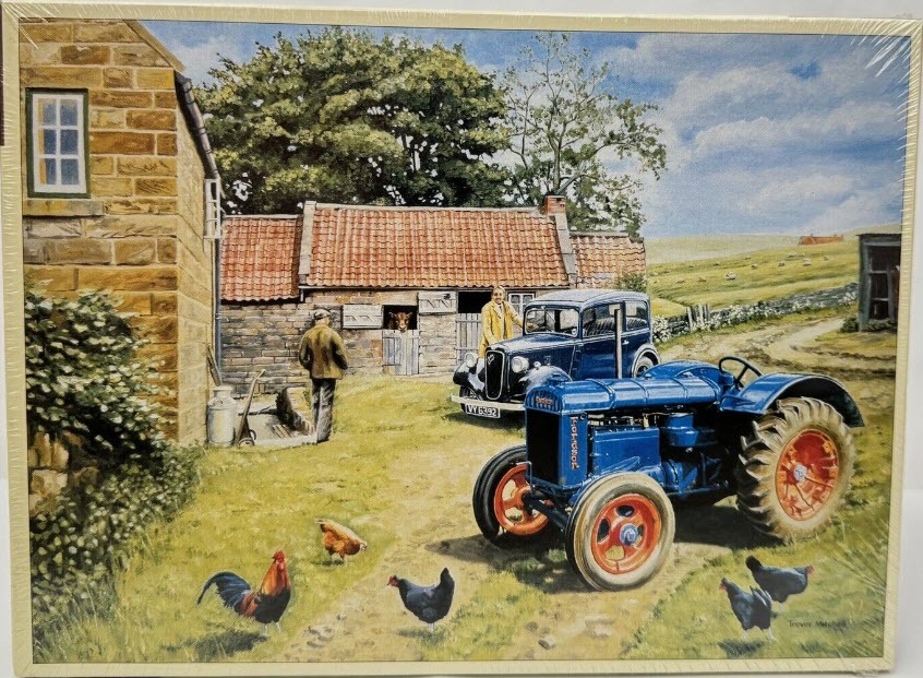 A rural farmyard scene featuring a blue vintage tractor, a classic car, and farm buildings on a sunny day.