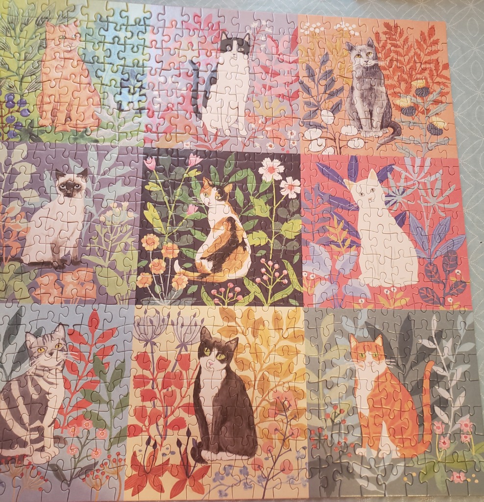 An illustration of nine different cats sitting amidst various botanical backgrounds arranged in a grid.