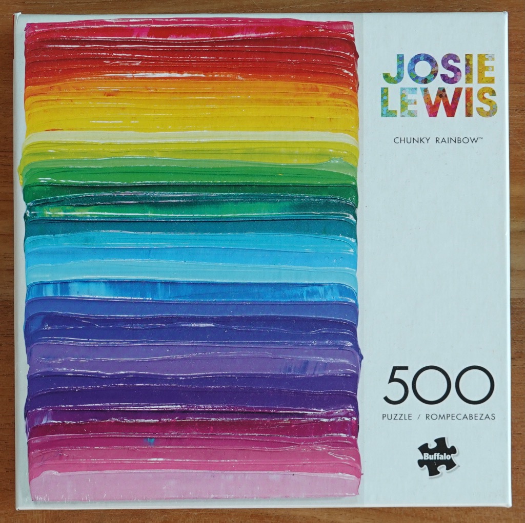 An abstract painting featuring thick, horizontal bands of a rainbow spectrum rendered in impasto style.