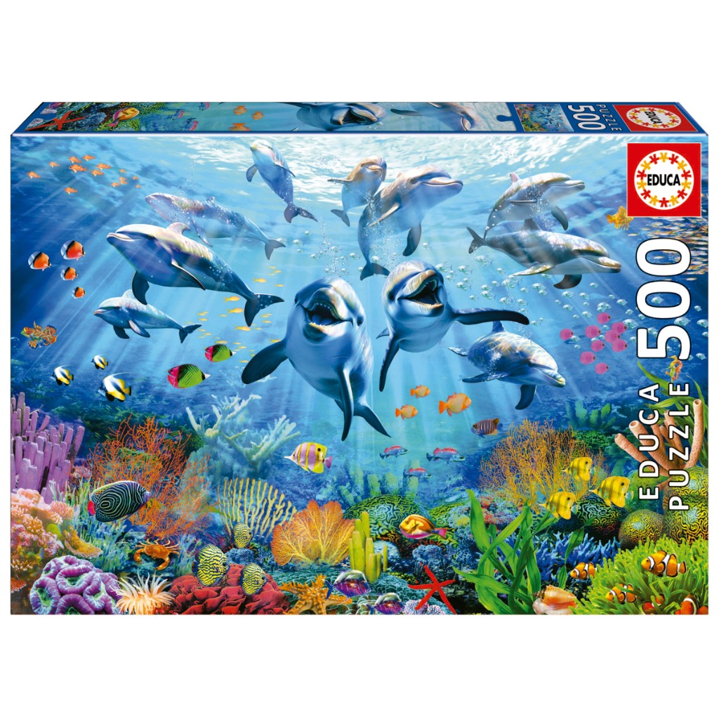Underwater scene with a large pod of dolphins swimming above a vibrant coral reef filled with colorful tropical fish