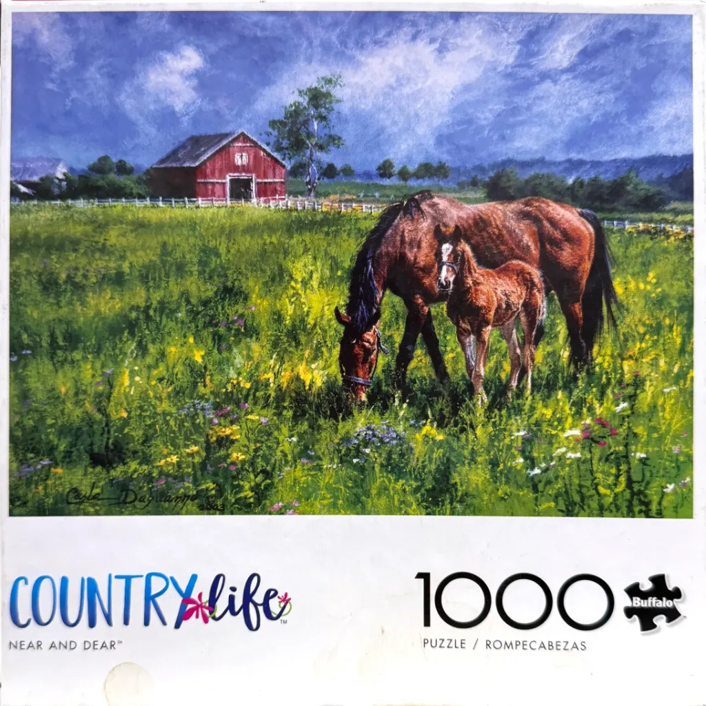 An oil painting of a brown mare and her foal grazing in a vibrant wildflower meadow in front of a red barn.