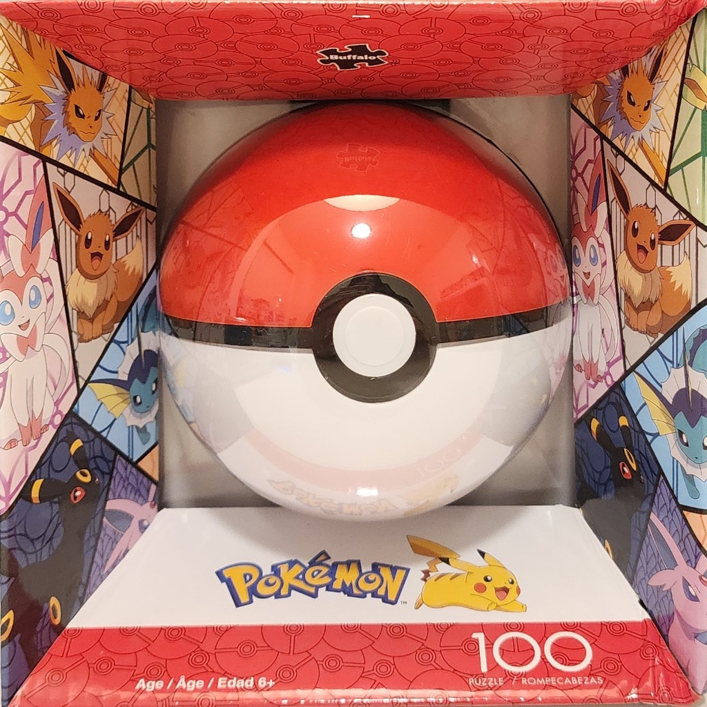 A Poké Ball shaped container surrounded by triangular panels featuring various Eeveelution Pokémon characters.