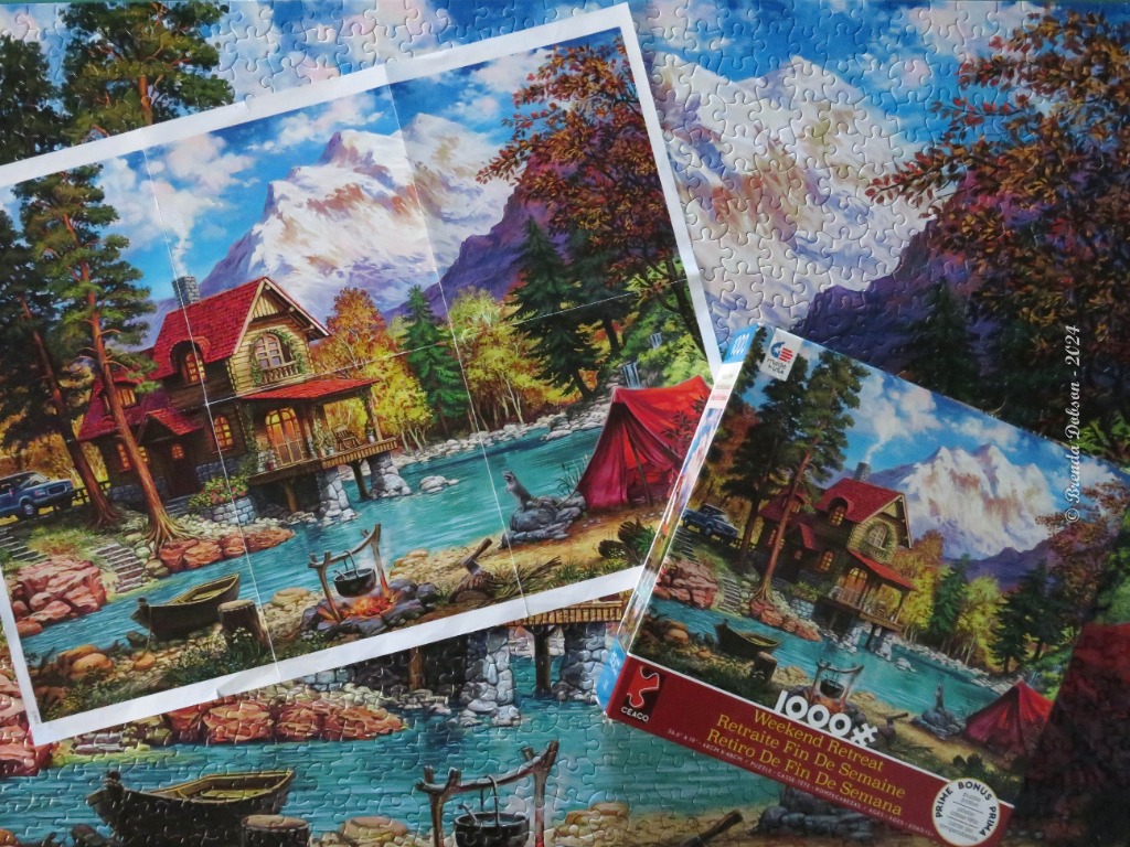 A peaceful lakeside cabin scene nestled in the mountains during autumn.