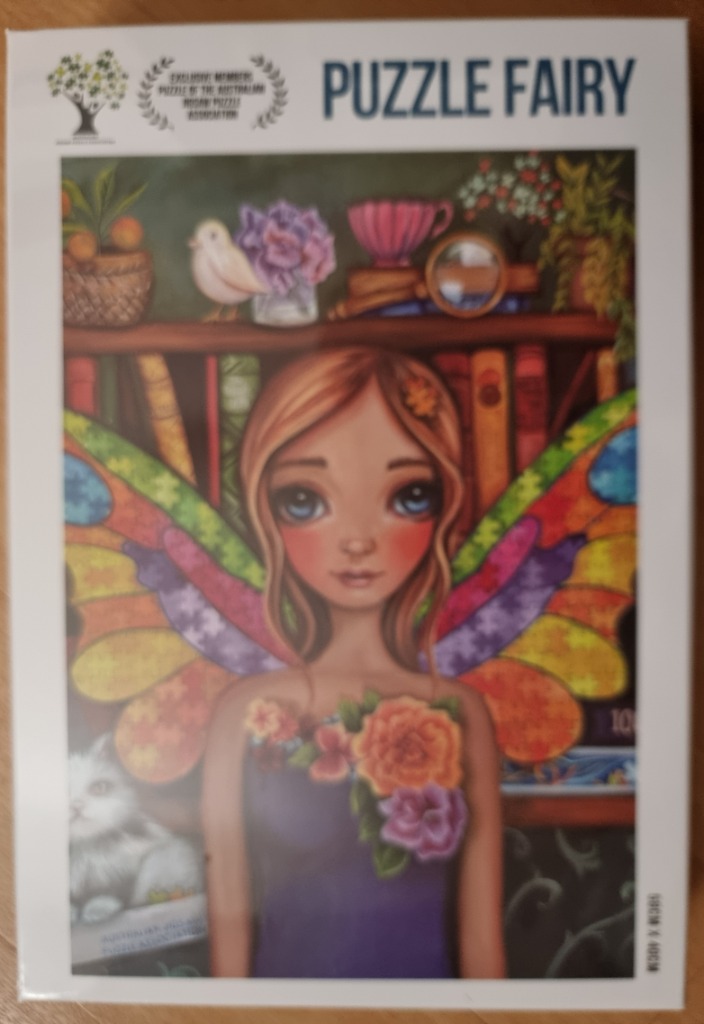 Illustration of a fairy with multicolored wings and a floral bodice in front of a bookshelf.
