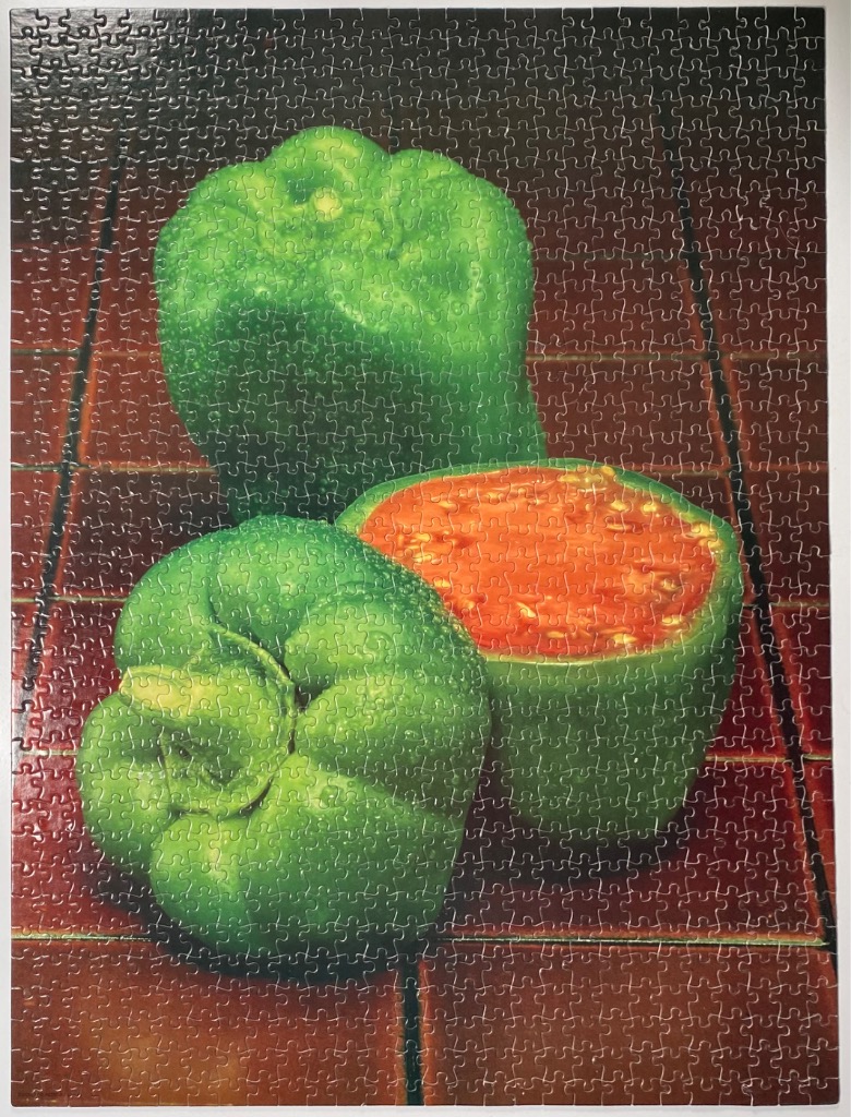 A still life painting of two green bell peppers, one whole and one halved, sitting on a dark red tiled surface.