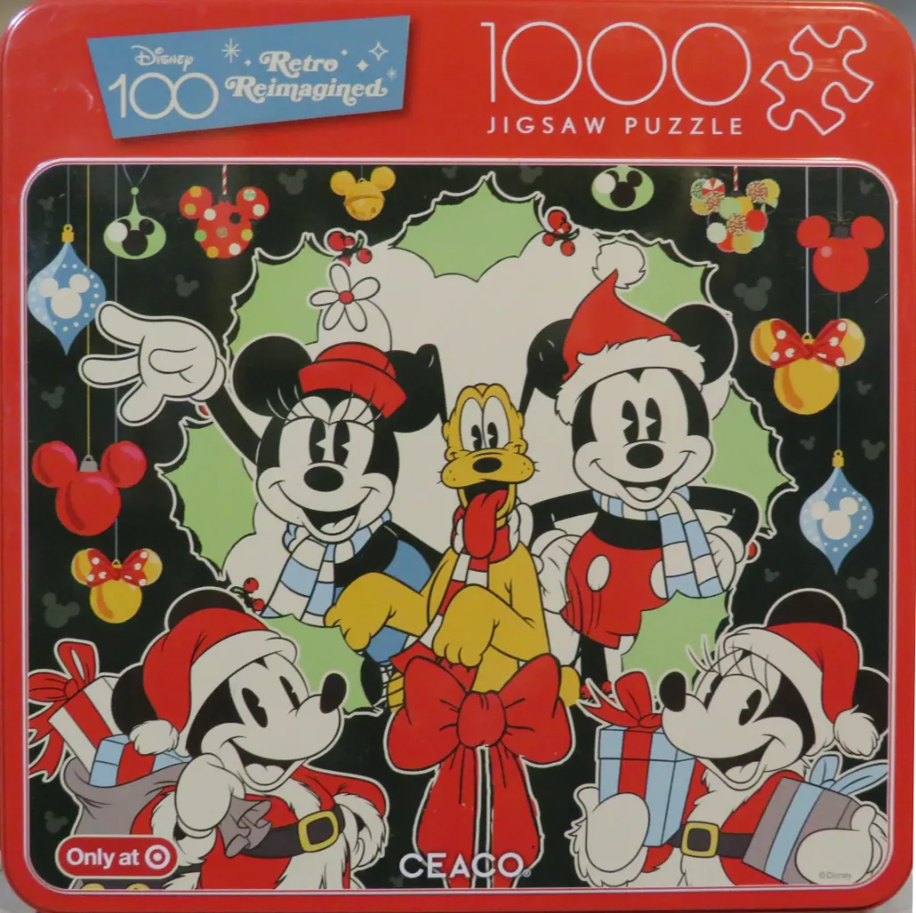 Cartoon holiday scene with Mickey Mouse, Minnie Mouse, and Pluto surrounded by festive ornaments on a black background.