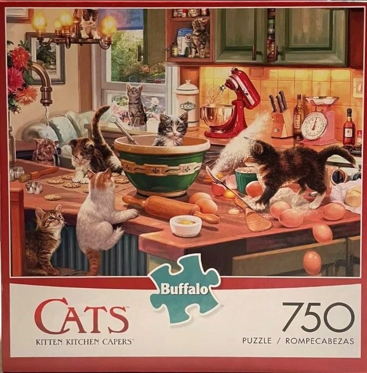 A whimsical illustration of several kittens causing chaos in a warm, rustic kitchen.