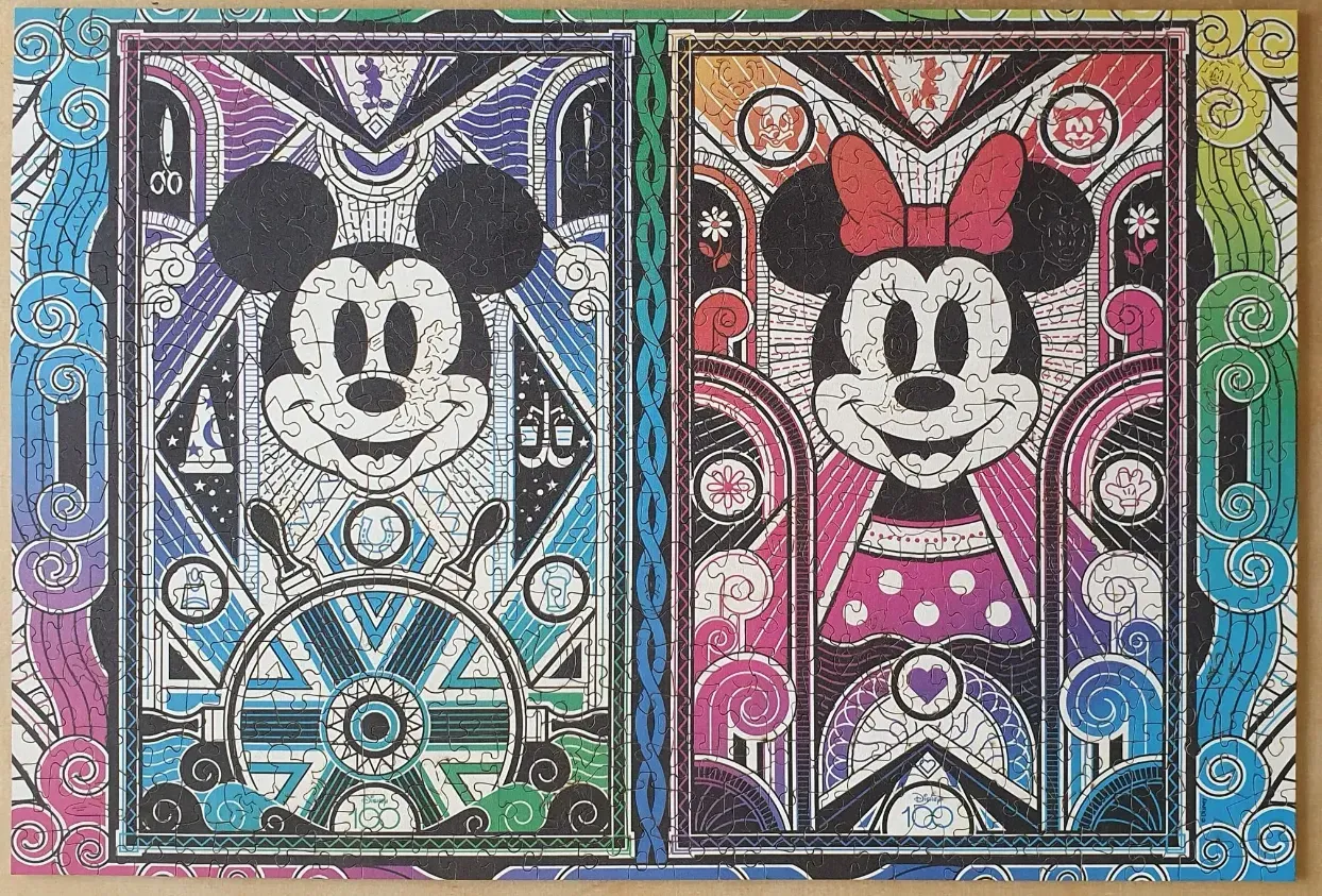 Side-by-side illustration of Mickey and Minnie Mouse in an Art Deco stained-glass style.