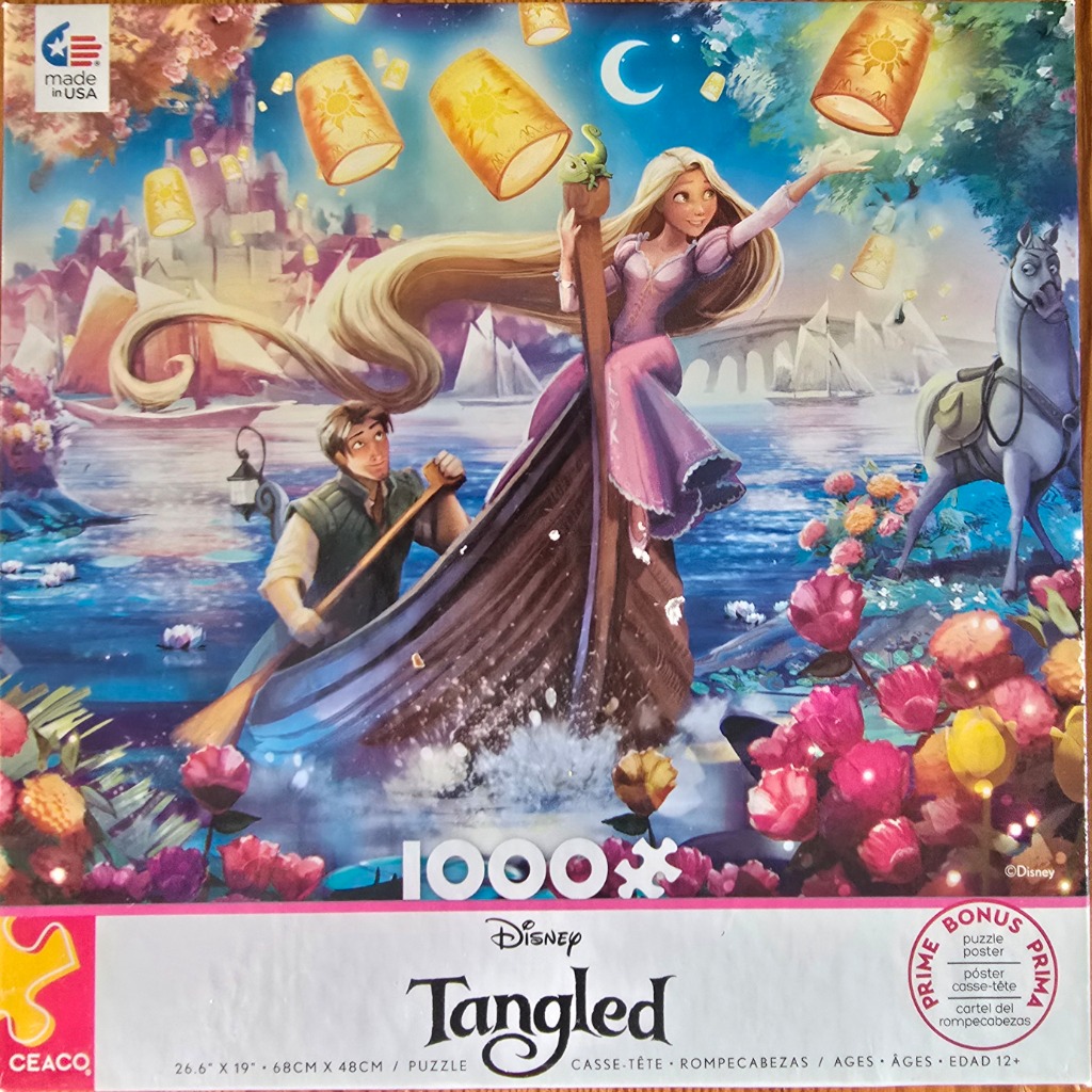 Animated scene of Rapunzel and Flynn in a boat surrounded by floating lanterns on a lake at night.