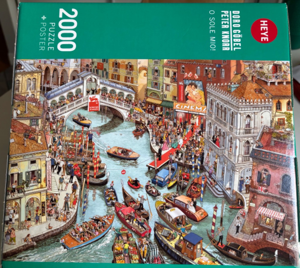 Colorful illustration of a bustling Venetian canal scene with gondolas, boats, and crowds.