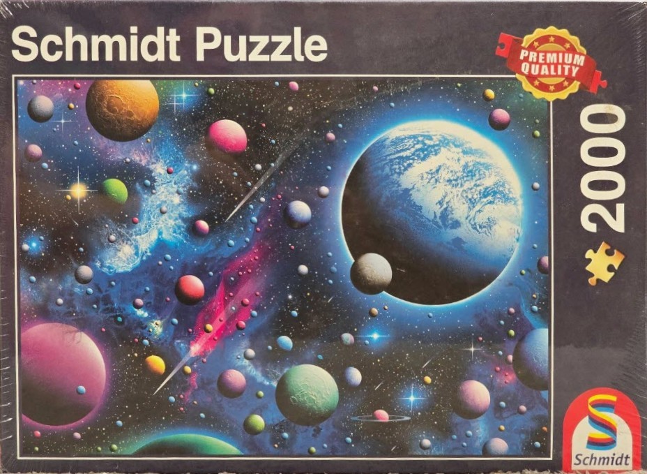 A vibrant space scene featuring a large Earth-like planet surrounded by a dense field of colorful smaller planets and stars.